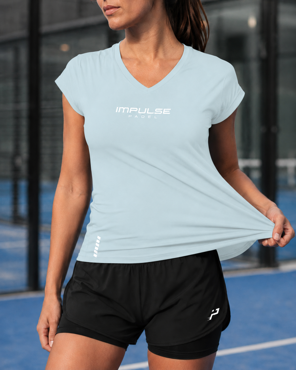 T-shirt technique de padel femme bleu glacier Impulse Padel porté de face