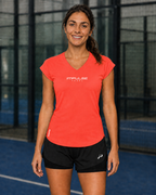 T-shirt technique de padel femme corail Impulse Padel porté de face