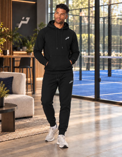 Ensemble Training Motion noir homme porté de face, monogramme Impulse côté cœur